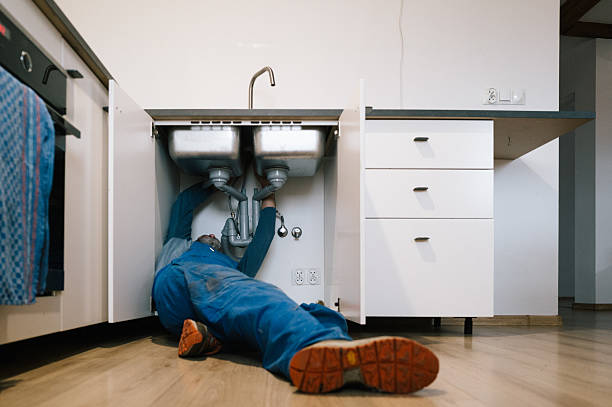 Professional Emergency Plumber technician working in Fairview, IL